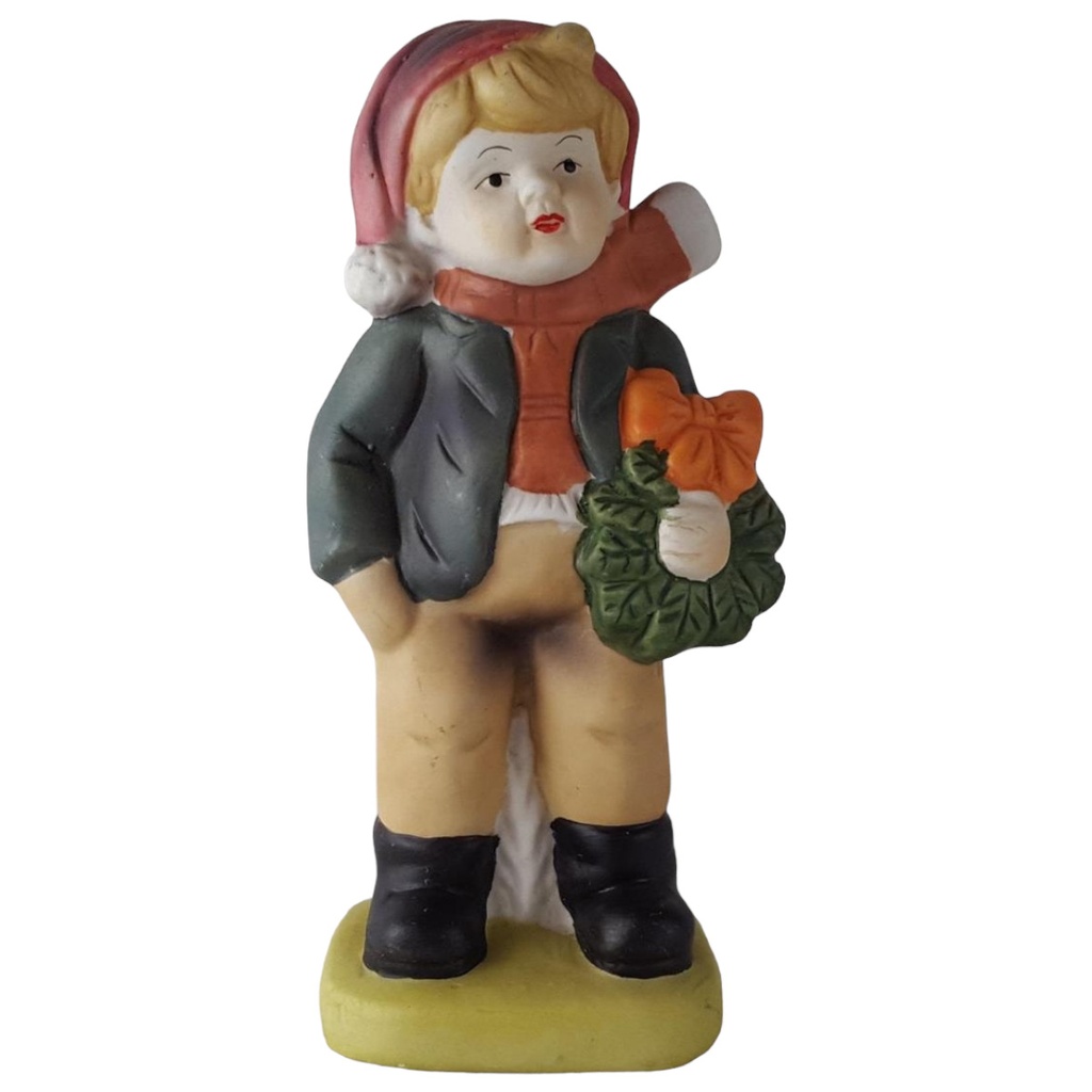 [45813419] Porzellan Figur Junge mit Weihnachtsdeko H 12,5 cm